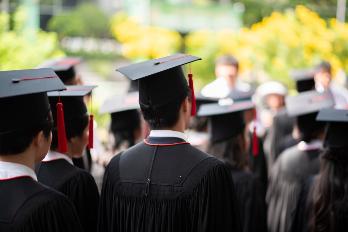 Row of university  graduates